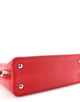 Taurillon Capucines PM Rubis