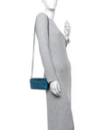 Metallic Caviar Quilted Small Boy Clutch With Chain Turquoise
