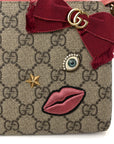 GG Supreme Monogram Face Embroidered Wrist Wallet Pink
