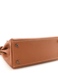 Togo Kelly Retourne 28 Gold