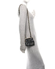 Patent Crumpled Lambskin Quilted Maxi Bow Clutch With Chain Black